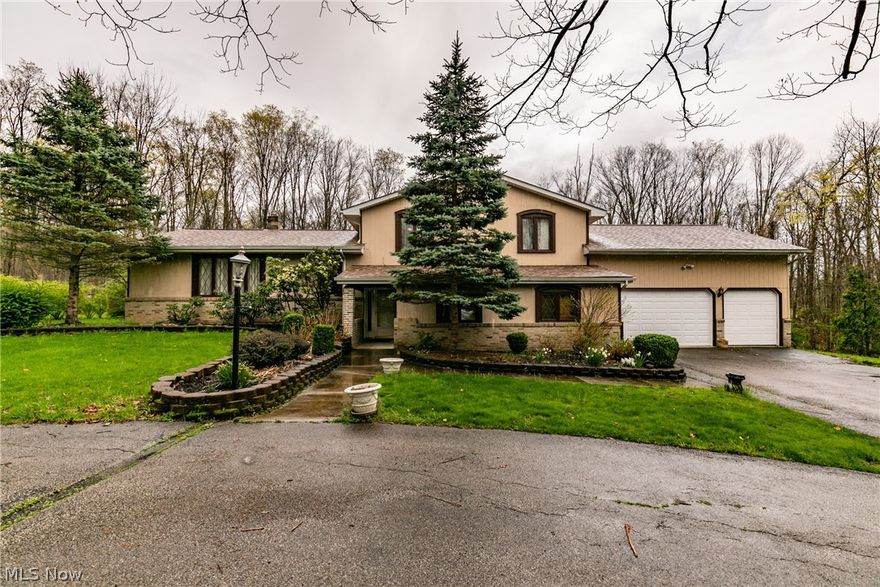 Welcome to this darling well maintained split level located in Chagrin Falls! Step inside and take a look at the beautiful staircase and banister! A lovely kitchen with a stunning backsplash to accent the wood cupboards. Three nicely sized bedrooms, and the master bedroom has an additional bonus room which could make a wonderful sitting area or walk in closet! A family room and bar room downstairs which would be the perfect entertaining spot! Large backyard and a charming deck to enjoy these beautiful spring days! A/C unit is 2020, HWT is 2019 and Well Pump is 2020.