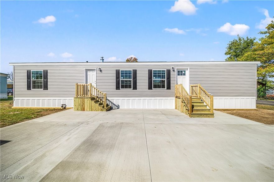 Welcome to this stunning 2024 new manufactured home! This beautiful two-bedroom, two-bathroom residence boasts modern amenities and sleek finishes throughout. The kitchen is a culinary dream, featuring: - All stainless steel appliances, including a microwave, dishwasher, refrigerator, and deluxe gas range - White cabinets for a bright and airy feel - A butcher block island for additional counter space and storage - A farmhouse-style double basin stainless steel sink The bathroom is a serene oasis, featuring: - An LED lighted framed mirror - A glamorous tiled shower with rainhead shower and china sinks - An extra linen closet for added storage Additional features include: - High-efficiency furnace for cozy and cost-effective living - Easy-care vinyl floors throughout - Modern fixtures and finishes throughout Enjoy the convenience of living close to: - Freeways - Shopping centers - Malls - Restaurants - And much more! Don't miss this opportunity to own a brand-new home in a prime location!