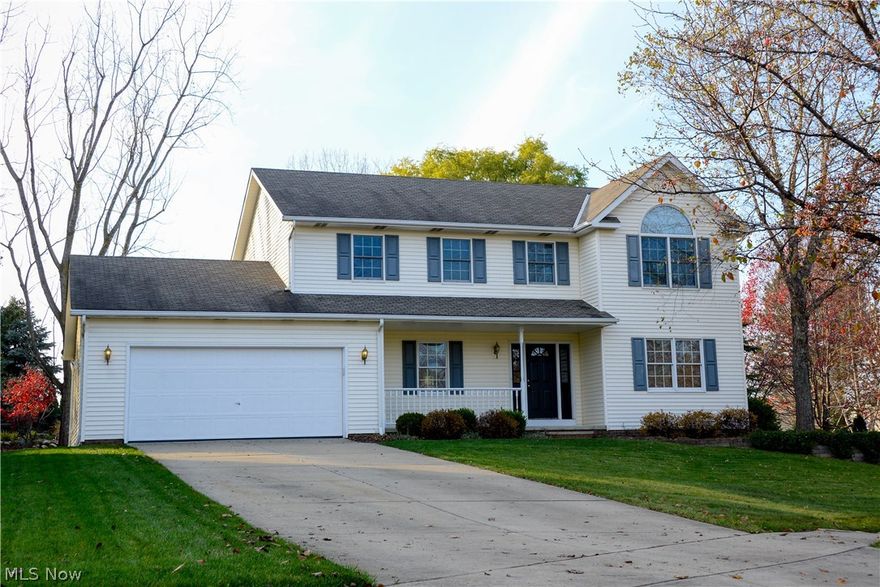 Welcome home to this beautiful four bedroom, three bathroom colonial. This home features a formal dining room or home office, living room, family room with mantled fireplace, eat-in kitchen and a large 6x6 pantry! The kitchen is completely remodeled with custom cabinets, granite countertops, tile backsplash and stainless steel appliances. Ceramic tile and hardwood flooring throughout most of the first floor. Updated half bath and first floor laundry with an exterior door leading to the backyard. This home offers a large master suite with vaulted ceilings, spacious 6x10 master closet and master bath with double sinks and a soaking tub. Three additional bedrooms and updated full bathroom complete the second floor. This home has a front porch and backyard paver patio that offer a private and peaceful surrounding on this quiet cul-de-sac lot. HOME WARRANTY INCLUDED!