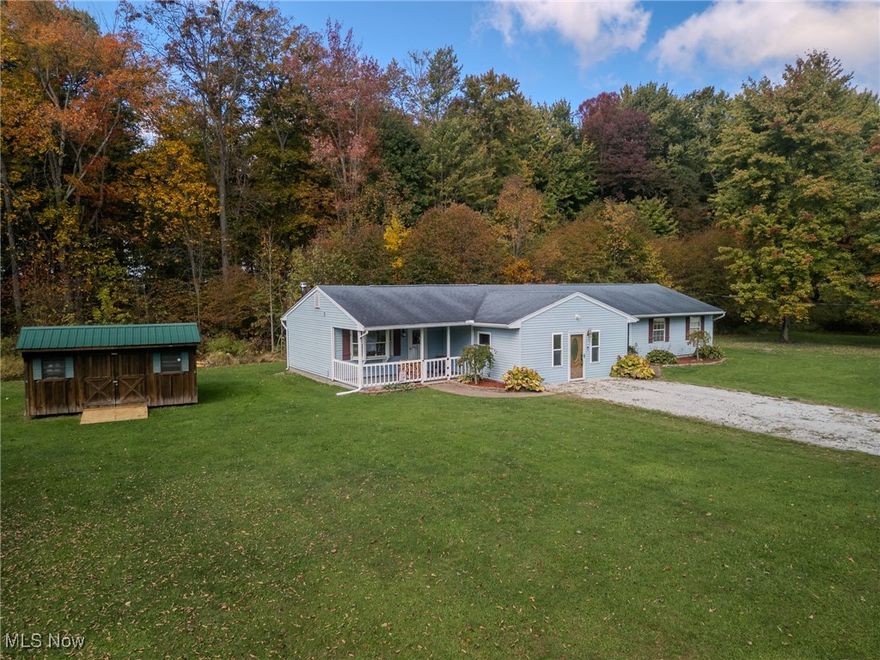 Step into this spacious ranch-style home set on a beautiful 1-acre lot! This updated open concept property offers 3 bedrooms and 2 full baths across approximately 2,300 square feet of living space! Located in the Geneva Area City School District, this home combines a serene private setting with convenient access to area amenities.  All three bedrooms are comfortably sized with ample closet space, while the two full baths feature modern finishes. Additional highlights include a large entrance foyer with a wood-grain epoxy bar and a convenient main-level laundry off the kitchen. The kitchen is a standout with wrap-around marble-look epoxy countertops, barstool seating, light gray cabinetry overlooking a large living room! An adjacent dining room provides the perfect space for gatherings! This home is for the whole family to enjoy! Outdoor living is easy with a front porch, rear deck, and shed! The large front and backyard offer room to play, garden, or expand. Don't miss the chance to make this versatile home yours!