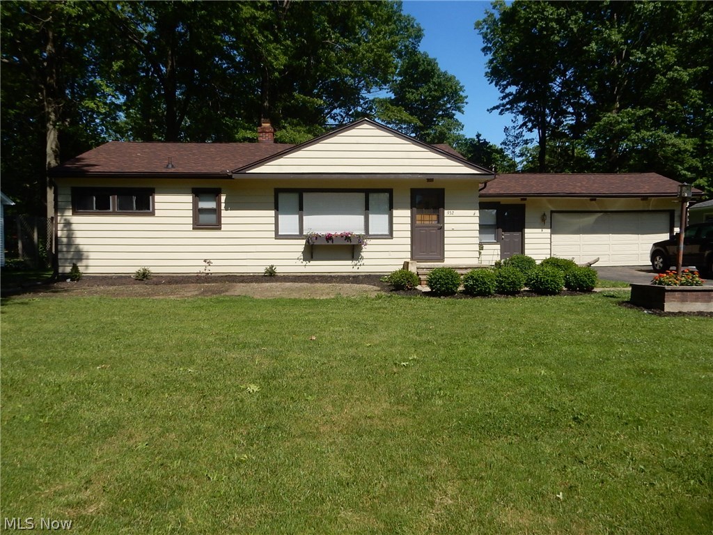 Totally refurbished ranch home in the Kent State University / Ashtabula Arts Center part of town. Since May of 2017 : Roof is new, furnace and hw tank are new, basement footers were all dug up and walls sealed around the front and north side of house, plumbing and electric was all updated, hardwood floors refinished, new Levelor blinds in living room, new ceiling fans, new appliances--over range microwave, refrigerator, and gas stove--, new kitchen cabinets, countertops, sink and faucets, new flooring in kitchen , bath and dining room, new light fixtures, new bathroom faucets, newly foamed insulation in basement and garage, attic insulated and automatic air circulation fan and vent installed in livingroom. And probably more! 14x28 screened porch expands your living area and leads out to a lovely shaded back yard , patio and firepit. Oversized 2 car attached garage has tons of storage space and a room addition to the back of it for even more room to store your tools and toys. Two sm