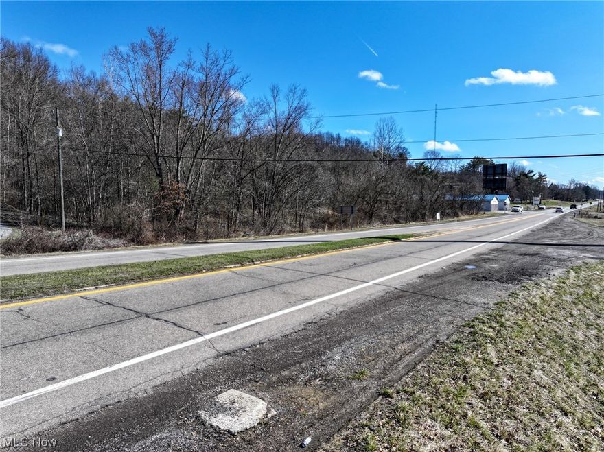 ONLINE ONLY AUCTION! BEGINS ENDING APRIL 2ND 6PM! What a RARE opportunity! Talk about a great location being located just one exit north of I-70 and one exit south of SR22(Salt Fork State Park) exit with high visibility to I-77 and high traffic count and no zoning, bring your commercial plans! Possibilities are endless, Travel Plaza, Fast Food, RV Park, Dispersal Well, Shopping Center, Hotel, you be the judge! Buyer is responsible for due diligence. We will be offering this property in 2 Land Parcels (14.59 acres & 32.41 acres) and 2 Oil/ Gas parcels (Open/ Unleased). Feel free to walk the property at your convenience and bid your price!
