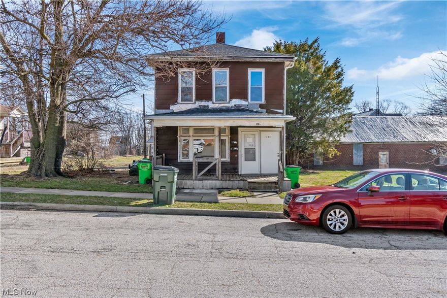 Great investment or owner/occupant opportunity with TWO separate homes on one parcel!! One single family home in the back has 2 large bedrooms upstairs, spacious living room, dining room, a spare room off the dining room, kitchen, and full bath. The second home is a duplex in the front. The lower unit has a living room, dining room, kitchen/laundry area, an extra room off the kitchen, 2 bedrooms, and a full bath. This lower unit does need some TLC. The upper unit of the duplex is currently tenant occupied and has 2 bedrooms, living room, kitchen and full bath. Priced to sell as is. Seller will make no repairs.