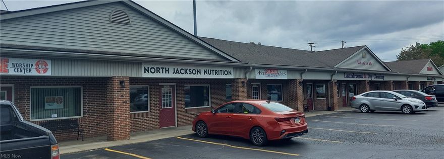 Commercial unit available for lease in plaza located at the center of North Jackson surrounded by established businesses. Unit was previously occupied by a salon that was there for nearly 15 years with many local clientele. Perfect for someone looking to branch out on their own or expand current business! Unit is approximately 1300 sq ft with private office and 2 partitioned styling areas, perfect for doing nails, brows or cosmetics. Located near the back of the unit is another wash area. Separate room previously used for laundry. Separate supply storage area with cabinetry,  counter top and a bathroom. Nice store front with large parking lot. This shop is ready to go, just bring your business!