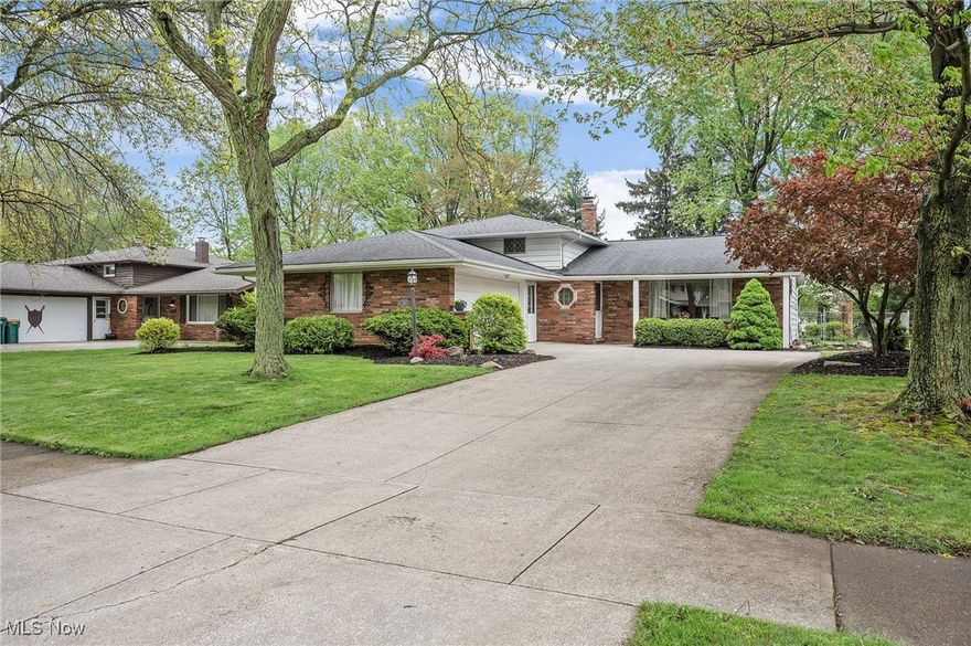 This recently updated and spacious split-level home offers over 2,000 square feet of thoughtfully designed living space and is nestled on a picturesque, tree-lined street with a large, fully fenced-in backyard—ideal for relaxing, entertaining, or letting pets roam freely. As you step inside, you’ll be welcomed by vaulted ceilings that create a bright, airy feel throughout the main living area, seamlessly connecting the living room to the dining space. The kitchen features sliding glass doors that open to the backyard, filling the space with beautiful natural sunlight and providing the perfect transition to outdoor living. Upstairs, you’ll find three well-appointed bedrooms, each with gorgeous natural hardwood flooring, and a full bathroom with dual access from the primary bedroom for added convenience. The lower level expands your living space even further with a cozy second living area that walks out to the backyard, plus a spacious mudroom/laundry area, a second full bathroom, and access to an oversized two-car garage with extra storage for all your gear. Whether you’re hosting, unwinding, or just enjoying the day-to-day, this home offers comfort, flexibility, and room to grow—all located just minutes from major highways, popular restaurants, and shopping destinations.