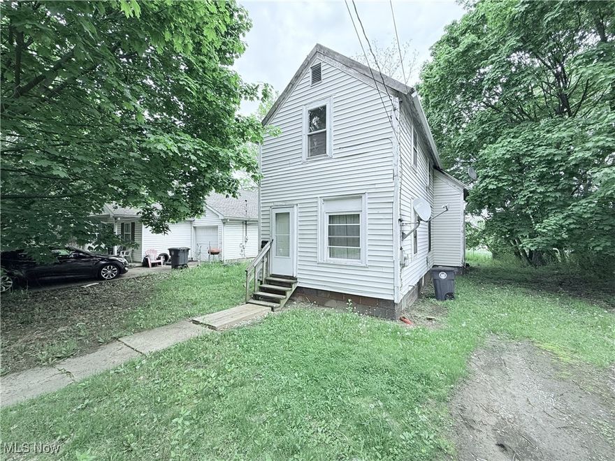 Welcome to 349 Talbot Ave, a classic 2-bedroom, 1-bath Colonial in Akron’s Ingleside Allotment. With approximately 770 square feet of living space, this home offers a functional layout, aluminum siding, and a full basement. Whether you're aiming to buy and hold or renovate for resale, there's value to be added here. Conveniently located with easy access to downtown Akron, major highways, and the University of Akron. Property is being sold as-is.