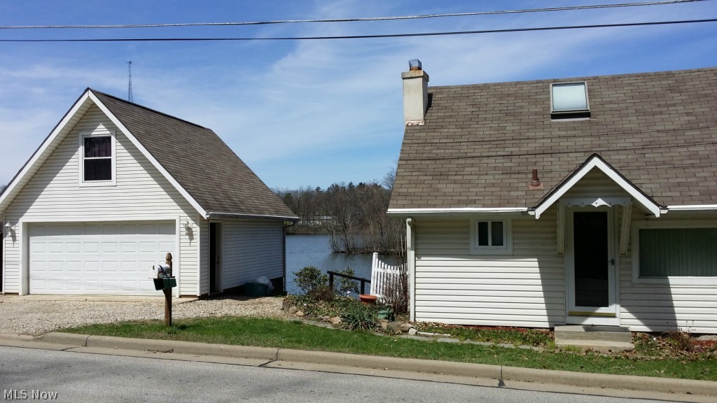 Quaint Cape Code on the North Reservoir in Portage Lakes. Perfect summer retreat/getaway or starter. Enjoy swimming ,fishing ,canoeing or kayaking right out your back door. This is a must see with beautiful views all around. priced to sell!!!!