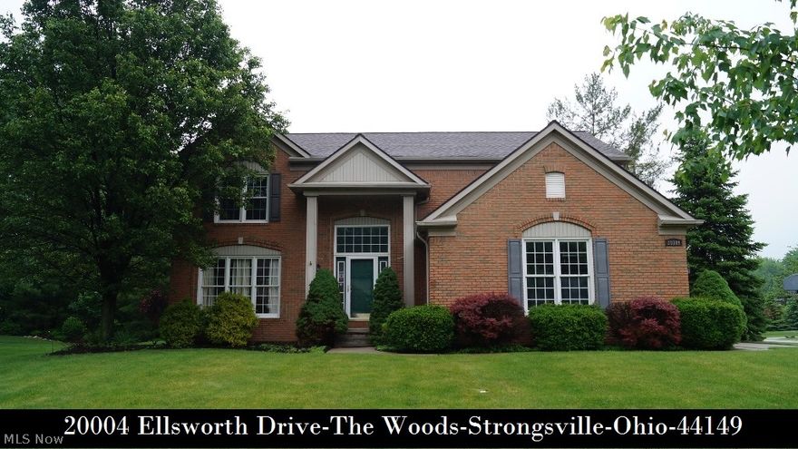 Charming Full Brick Front colonial with side load garage in The Woods! Bright and cheerful interior with large windows granting an abundance of natural light! 2 story foyer with hardwood floor, enormous kitchen with huge working island has all appliances - granite countertops- ceramic tile backsplash, spacious step-down family room with a gas fireplace and built-in bookcases, elegant dining room with bay window, vaulted Master suite has glamour bath with huge whirlpool tub and walk-in closet, and large nicely finished basement with glass block windows & B&W speakers ready for your home theatre! Newer roof  2012 - gas furnace  2013 - hot water tank 2011 - whole attic insulation 2015 - new interior paint and carpet 2015 - steel appliances including Samsung washer & dryer 2008! A beautiful brick paver patio overlooks private wooded rear yard with storage shed, security system and The Woods offers access to 8 acres of green space with playground-tennis courts-soccer field and access to Kin