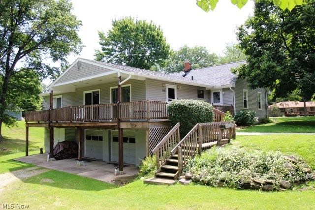 Outstanding value in Tallmadge on picturesque 1.34 acres offering a beautifully updated & maintained 3 bdrm, 2 bath ranch w/1632SF (main level)*Living room w/2 sliders to partially covered deck, wood floor & see thru wood burning fireplace w/gas starter* Family room (w/see thru wood burning fireplace w/gas starter), sky light, slider to deck & built in cabinets* Updated oak kitchen w/ceramic back splash, pantry, gas range, dishwasher, refrigerator & disposal* Breakfast room w/fan & access to screened porch* Formal dining w/fan & wood floor* Bedrooms w/wood floor & fan* Updated bath* Screened porch* Walk out lower level w/full bath & access to attached 2 car garage & huge workshop/utility room w/double door access to outside partially covered wrap around deck* Updated breaker box, 95% efficient furnace (approx. 2010)* Shingles & siding (approx. 2012)* Most windows updated (not incl sliding doors)* Lovely rolling 1.34 acres w/creek* Open, spacious, light & bright!