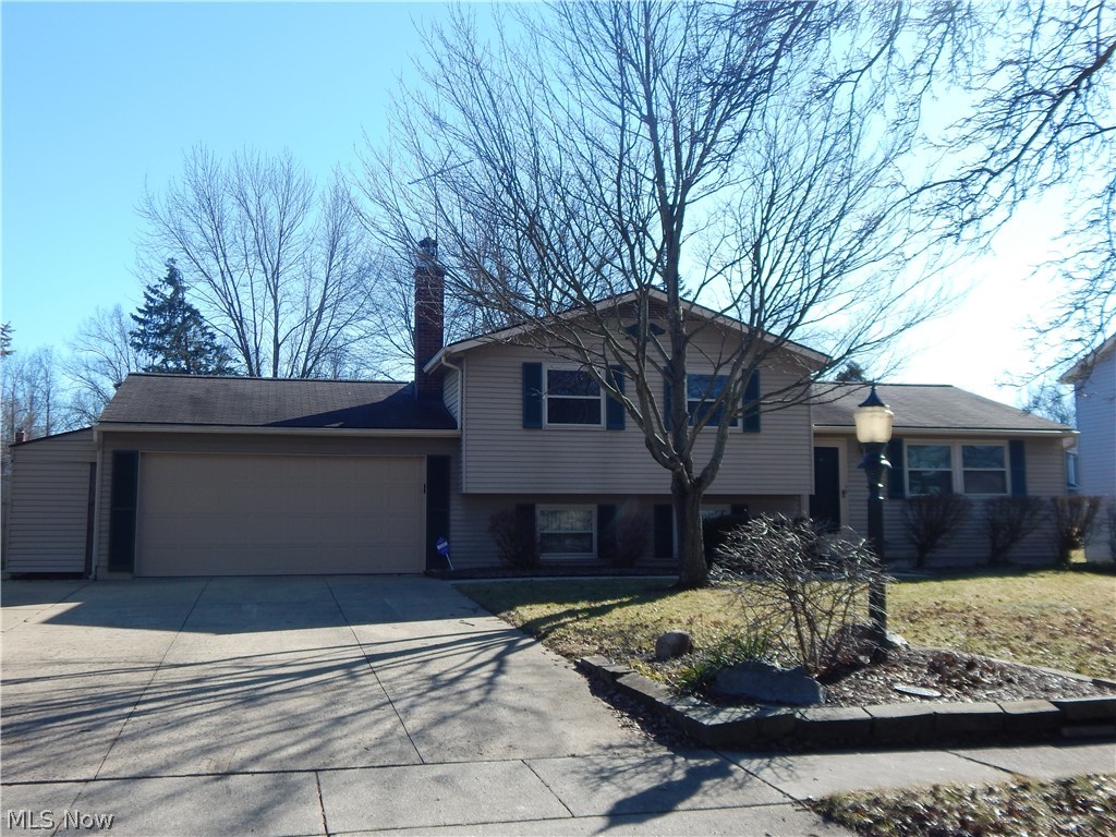 Freshly painted interior and carpet 1-21. Beautiful four level Split Home is covered with aluminum and vinyl protection! Also this home has 3 bedrooms, 2 full bathrooms, a family room with fireplace and lots of Seasoned hardwood to keep you warm and toasty! Mud room offers pet grooming station, The Recreation room has a slate top pool table! The Bonus room is very spacious! The inground jacuzzi is the perfect addition to this home! The backyard and deck is very quiet and serene! There are 2 Storage areas and a 20X60' Huge Garage for all of your storage.
The garage cave lovers will love this garage. Patio, deck off master and so much more.