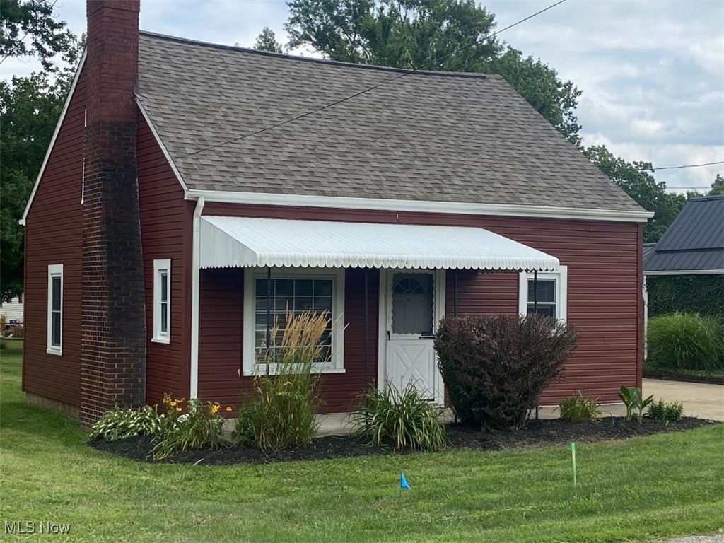 Affordable starter home or rental opportunity in Perry Township. Awning covered front porch 14x6 w/ concrete floor. Main floor: Living room w/ wood burning fireplace: Kitchen w/ refrig & range that can remain; 2 main floor BRs and a full bath. Upstairs, to the left is a bonus room (could be finished walk in closet, office space, storage), to the right is a bank of closets down the hall from the Primary BR 16x13, an additional closet in Room, and built in dresser drawers. Updates include, but not limited to: 2007 basement waterproofing, sump pump; 2007 water line from street to house replaced, 2020 Roof tear off and replaced; 2022 new Furnace and Central Air; 2023 Vinyl Siding; Front porch Awning cover; Concrete driveway to accommodate 4-6 vehicles, Thermal windows. Old tile flooring in basement removed (when waterproofed), currently unfinished. Lot space large enough to add garage or a carport on driveway area. Flat backyard (partial fence on north side) Located close to most Amenities you need (grocery, banks, school, fire department, police, sippo library, and many restaurants & shops) 10 minutes to Rt 21 or Rt 30. Call to preview inside TODAY. Immediate possession. Why rent when you can own!!