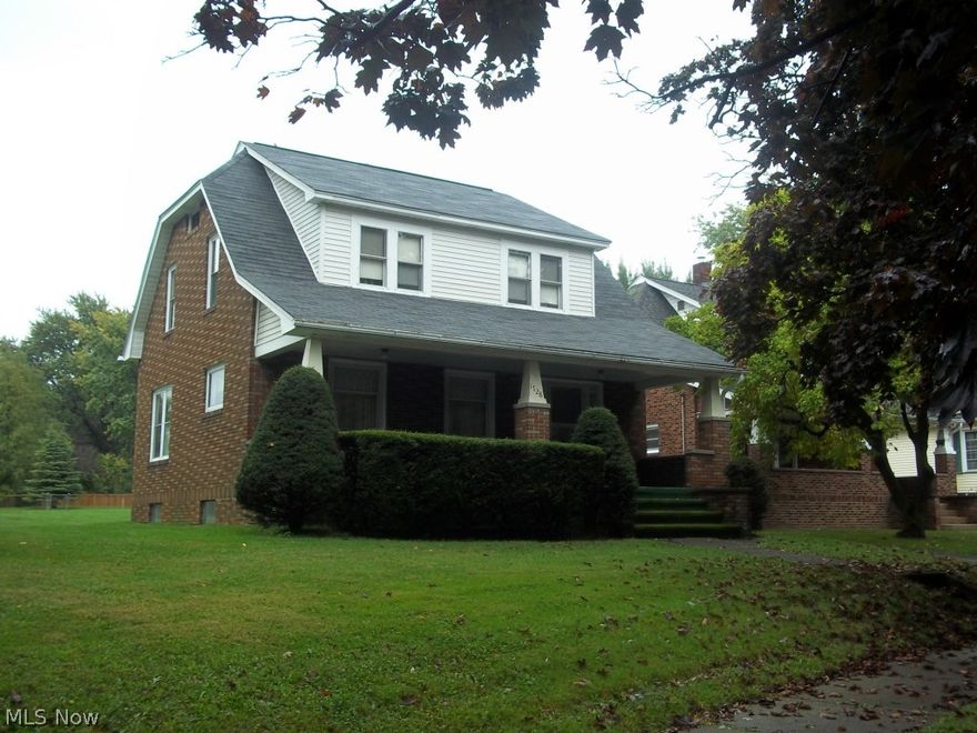 The owner Harbor Colonial. French  décor in LR to foyer. All beautiful natural woodwork and archway. 3 bedrooms with large closets. Walk up attic. Detached Garage. Fenced large backyard. Built and lived in by same family for over 80 years. Close to Lake.