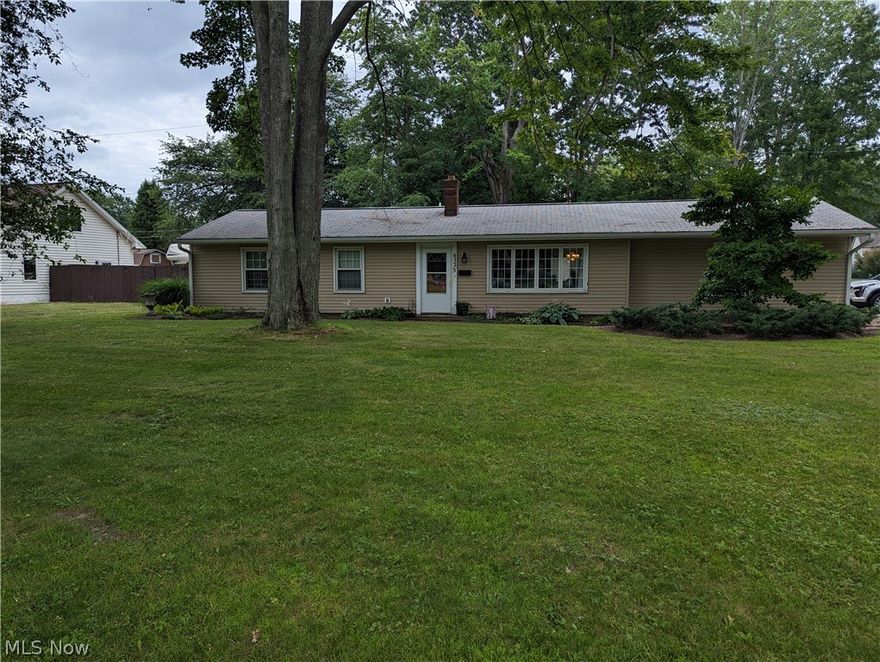 Beautiful 1412 sf two bedroom (could be converted back to a 3 bedroom) ranch located on a corner lot! Tastefully done throughout.  The ceramic tiled eat-in kitchen offers an abundance of storage and easy access to the patio and backyard.  Enjoy large gatherings in the family room and adjoining living room.  The living room also offers a lot of natural light and views of the picturesque front yard.  The master bedroom offers a large walk-in closet that was formerly the third bedroom. The bathroom updates are in the process of being completed.  The back yard is partially fenced in with easy access to the oversized detached 24 x 24 garage that is equipped with 220, and a work bench.