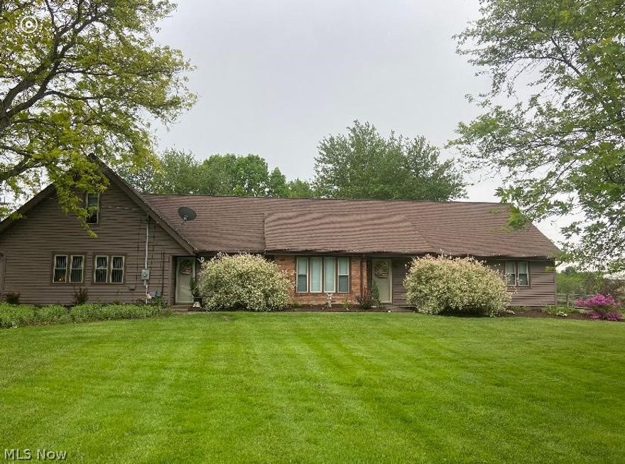 This 4 bedroom/ 4 full bath with additional kitchenette is a must see. Country setting, nestled on two acres of well maintained  landscape, just minutes from town. Many updates throughout including tankless hot water tank 2016, water softener 2022, light fixtures, tile flooring, kitchen and bathroom fixtures, cement walkway, extended deck. Another great amenity is a 3 car garage/outbuilding that can fit many uses.  Many windows throughout let the great outdoors in. A cozy fireplace adds comfort and ambiance. A screened in gazebo makes a wonderful spot to relax and take in the the country scenery. Lovingly maintained and pride of ownership throughout. What an amazing opportunity for your own slice of country living!