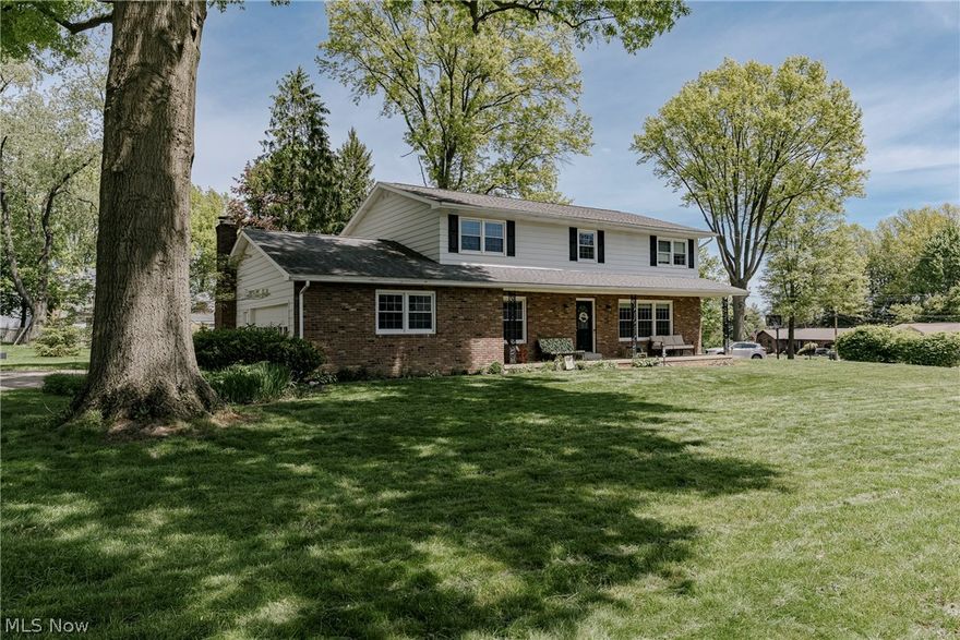 Welcome to 136 Blue Hill Lane — a spacious and beautifully updated colonial located on a quiet street in sought-after Fairlawn. Set on a large lot with an inviting front porch, this exceptional home blends timeless charm with modern updates and family-friendly living.

Inside, the bright foyer opens to a spacious living room filled with natural light and flows into the formal dining room, creating an ideal layout for entertaining. The updated kitchen features granite countertops, a center island, subway tile backsplash, stainless steel appliances, and an eat-in area, all open to the warm family room with a brick fireplace and sliding doors leading to the backyard deck. A first-floor office, convenient mudroom, half bath, and attached 2-car garage add everyday functionality.

Upstairs offers four generously sized bedrooms, including a private primary suite with abundant closet space and an updated ensuite bath featuring a tiled step-in shower and granite-top vanity. The additional bedrooms offer ample closet space, and a second updated full bath completes the level.

The finished basement adds valuable living space with a large rec room, bonus room currently set up as a bedroom, and a full bath, along with unfinished storage and laundry/utility space. Finished basement areas add to the home’s total finished square footage.

Outside, enjoy a large backyard with a deck, stamped concrete patio, and shed — perfect for relaxing, entertaining, and everyday family living. This amazing home offers the perfect combination of space, comfort, and style in a highly desirable location.