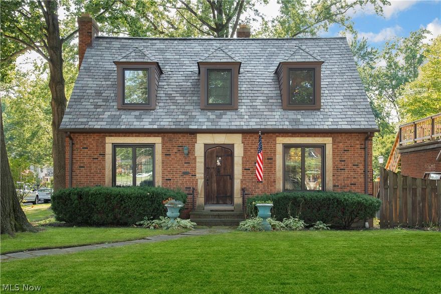 Solid all brick Cape Cod in Beach Cliff II with private beach privileges just a stroll away. Charming arched wood door greets you as you enter the formal living room with beautifully refinished ebony stained floors. A nice fireplace with built in shelving and bright sunlit room leads into an open concept newly remodeled kitchen with stainless steel appliances. Newly remodeled is a half bath and first floor dining with double french doors that can also be used as a home office or guest bedroom if so desired. Original wood flooring leads up the stairs to a newly finished vaulted ceiling bedroom above the garage and continues up to and throughout the second floor. The second floor features two spacious bedrooms and an updated full bath. Partially finished basement with second fireplace has glass block vented windows and can easily be used as a recreational space. Enjoy the beautiful fall weather hanging out with family and friends fully fenced private back yard. BRAND NEW Furnace, AC and