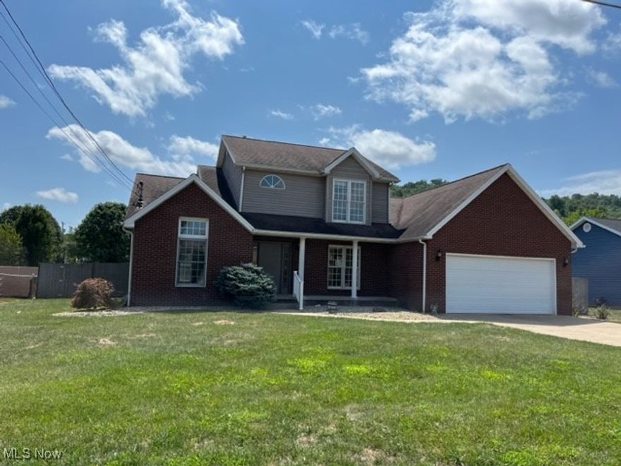 Contemporary two story with master bedroom suite on first floor. MBR has been freshly painted and new hardwood floors installed on first level, new carpet on steps and second floor. Formal living and dining rooms, 1st floor family room with gas log fireplace, covered front porch, double doors off eat in kitchen open to a large deck with covered picnic spot at the end. Privacy fenced back yard, 2 car garage.