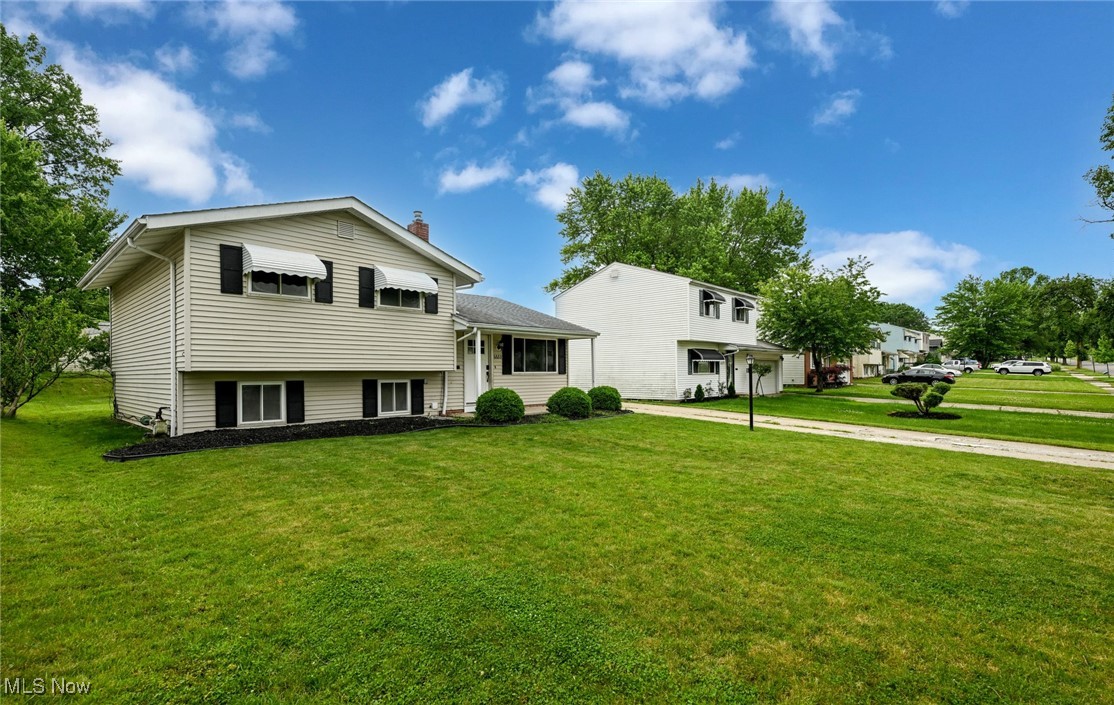 Welcome home to 6633 Tamarind Dr. conveniently located in the city of Bedford heights. Inside this split level you will find a touch of elegance and warmth. This home features 3 bedrooms that have been freshly painted and new carpet for your comfort. There are two bathrooms with the full bathroom located up and the half bath located in the lower level. The living room offers new luxury vinyl for easy cleaning. Next to the dining area is a the kitchen that has granite counters, a stainless steel refrigerator, a range, and a microwave all included with the home. Through the sliding doors you have access to the covered patio that's primed for entertaining guests. The finished rec room in the basement gives you additional living space perfect for relaxation! New sewer line from house to the the street so you can have piece of mind. Newer Hot Water Tank & Central AC Unit as of last year. The well-manicured landscaping and nice sized back yard makes this the perfect home. The large 2 car garage offers bonus storage space above. Seller is willing to escrow driveway replacement. Schedule your showing today!