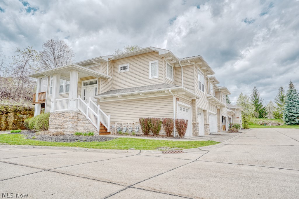 Welcome to 124 Stonegate! This exquisite 3 Bedroom 2.5 Bath Townhouse is a MUST SEE. As you enter the private Stone Ridge development, you will instantly be immersed in the serenity and beauty of the preserved nature and you will also enjoy how secluded these townhomes are. 124 Stonegate has a private patio as well as a 2-car attached heated garage. As you enter the property, your jaw will be sure to DROP as you gaze at the 20+ foot tall ceilings complemented by large windows shedding immeasurable amounts of light upon your first floor. This beautiful Townhome is complemented by Stainless-Steel appliances and a second-floor laundry area that will remain in the home. This home also has a large master bedroom that has its own private master bathroom with a soaking tub, Jack and Jill vanity set-up, a spacious walk-in closet, and a shower! You also have two more nicely sized bedrooms located on the second floor. You will be sure to feel like a king or queen when you wake every morning and