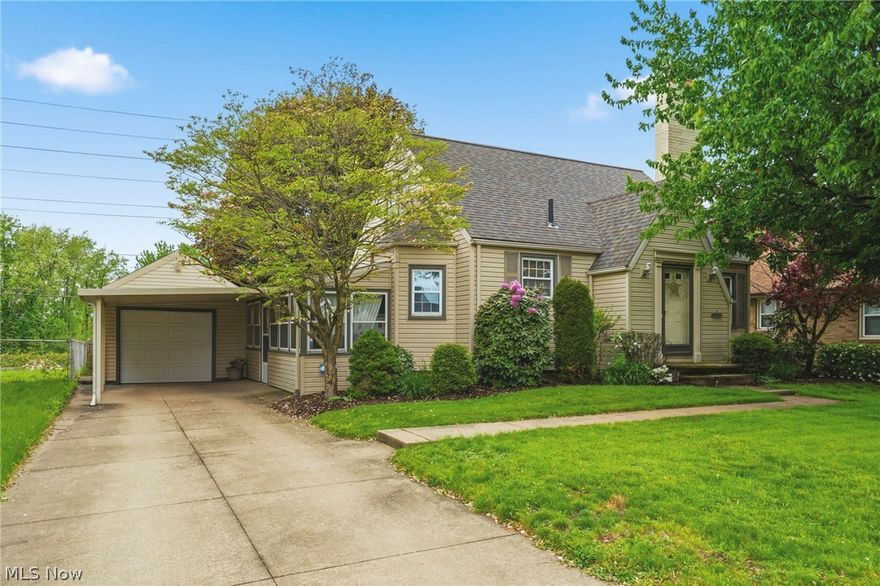This adorable bungalow in the heart of Perry Townships West Manor neighborhood offers a warm and inviting main level with a bright living area, functional kitchen, and easy flow to the outdoor deck and sunporch. Offering 3 bedrooms and 2 full baths.  The oversized deck provides ample room for entertaining, dining, or relaxing, while the fenced backyard is ideal for pets or play. The finished lower level adds valuable square footage perfect for a family room, home office, fitness area, or hobby space. With a 3-car garage and carport, this property provides exceptional storage and parking flexibility rarely found in the area.  This home is situated close to all major highways and amenities for shopping, dining, entertainment and the Hall of Fame Village.  Call today to schedule your private showing.
