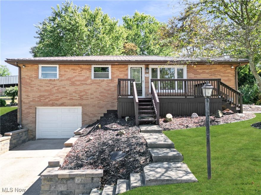 Welcome to this beautifully remodeled 3-bedroom, 1.5-bath brick ranch located in the heart of Wintersville, close to local amenities. Curb appeal shines with a brand-new retaining wall, setting the tone for the quality updates inside. Step into a spacious living room filled with natural light, leading to a stunning new kitchen featuring granite countertops, soft-close cabinets, and modern finishes. Both bathrooms have been completely updated, and new flooring runs throughout the home. The finished basement offers a large rec room, perfect for entertaining or relaxing. Major updates include a new roof, windows, furnace, central AC, and electric panel—ensuring peace of mind for years to come. This move-in ready home blends comfort, style, and convenience in an ideal location.