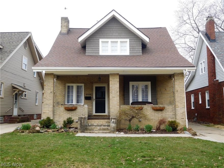 This adorable all brick cape cod home awaits you!!  Be greeted by the cozy front porch perfect for enjoying a gorgeous spring day AND the exterior was freshly painted in 2017!   Spacious living room with refinished hardwood flooring (2009) and fireplace.  Dining room features hardwood flooring, a cute bench seat and two corner built in china cabinets.  The kitchen overlooks the dining area and has a breakfast bar perfect for a few stools!  All kitchen appliances stay with the property! Two bedrooms tastefully decorated and a full updated bathroom (2016) complete the first floor.  Now comes YOUR paradise--master suite upstairs is HUGE with walk in closet/organizers, newer carpet (2017), skylights to view the stars at night while lying in bed, AND a FULL updated bathroom complete with glass door tiled shower, vanity, lighting and flooring.  Wait, THAT'S NOT ALL!!  Other major updates include roof (2013), furnace (2007), water tank (2014), electric panel (2017), a/c (2017) and some window