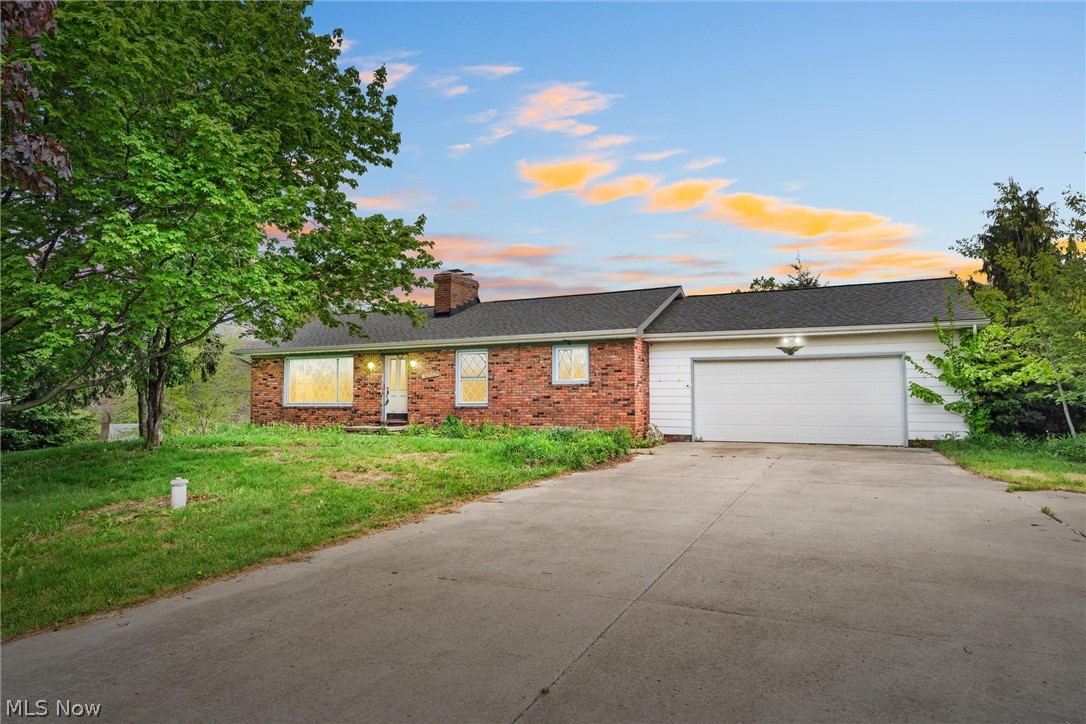 Sprawling ranch situated in a very sought after area in Concord. With over 1.12 acres of land this home has an abundance of possibilities. Upon entering you will notice the oversized living area with a gorgeous wood burning fireplace. The eat in kitchen where many of your favorite recipes will be made had plenty of countertop space and cabin like cabinetry. Appliances included. All three bedroom are on the main level with attached master bath and additional full bath. Let your imagination run wild with the lower level. Partially finished with walkout, gas fireplace this could be perfect for entertaining. There is also and additional full bath, stove and sink! And a ton of storage space. Now lets get to the backyard. With over an acre of land, private I am sure you will be spending a lot of your evening around the firepit, the oversized deck or the tucked away gazebo area. Yes, it has all of this! Need storage for all your toys? There is also a massive pole barn with an overhang patio. Ranch, full walkout basement, acreage, pole barn. Can't get any better than this. You need to check this one out!