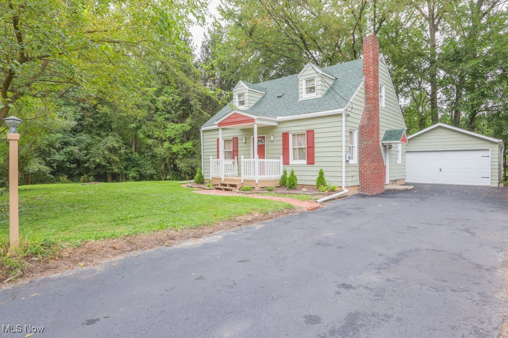 Midview Schools!! Carlisle Twp. Just listed 3 bedroom cape cod home on 3 parcels. last house on a dead-end street. Completely remodeled from top to bottom. 20 yr dimensional roof, asphalt driveway, 2 1/2 car garage, landscaped. Inside includes a custom kitchen with 42 inch upper cabinets. All stainless steel appliances ( refrigerator to be installed prior to transfer ). Deck off the dining room. Beautifully tiled full tub enclosure and new fixtures. LVT flooring throughout main level with exception of the first floor bedroom which is carpeted. The other two beds upstairs are carpeted as well. Full finished basement with a separate utility/laundry room with a shower. 2 window a/c units also included. Also full home warranty paid by seller! Same owner since 2008. Great buy in the Midview school district
