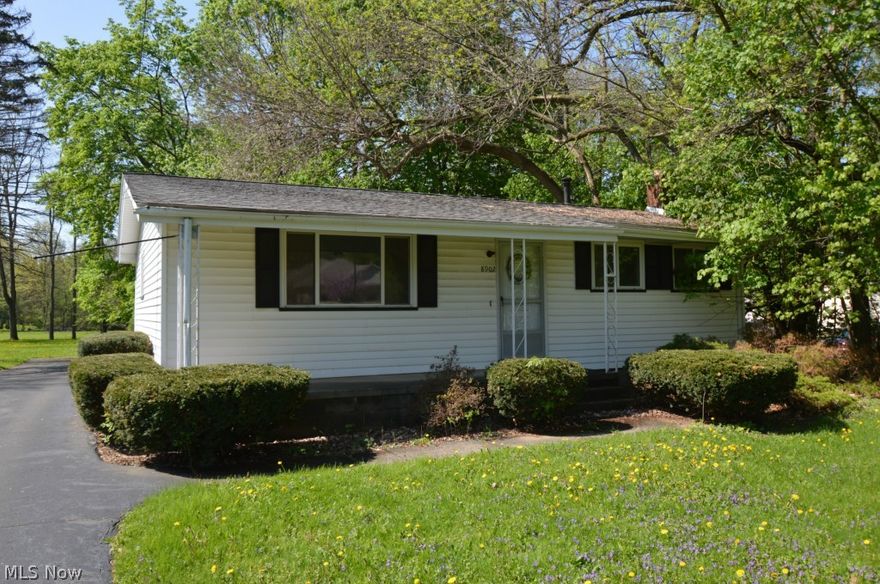 Ranch home on over a half acre lot.  The main level of this home is comprised of an eat-in kitchen, spacious living room, two bedrooms, and a full bath.  The full basement is comprised of a rec room and laundry area and provides ample storage.  Exterior features include a large front porch, rear concrete patio, and two car detached garage.  Some plumbing repairs needed.  Rehab financing available.