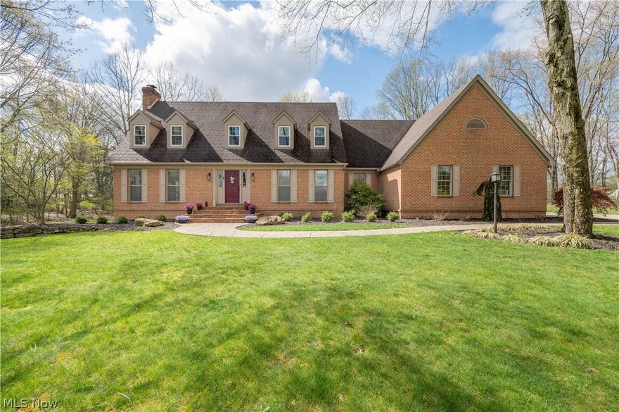 Welcome to this stunning 4 bedroom, 3 full bathroom home nestled on 1.5 serene acres at the end of a quiet cul-de-sac--offering privacy, space and exceptional design throughout! Step into the grand foyer and immediately feel the elegance this home provides. The breathtaking great room with fireplace serves as the heart of the home, flowing seamlessly into a large screened-in sunroom-complete with TV that stays-overlooking a peaceful tree lined backyard. The gourmet eat-in kitchen is a standout feature, boasting rich cherry cabinetry, granite countertops, stainless steel appliances, farmhouse sink and yes HEATED flooring! This is perfect for both everyday living and entertaining. Convenience meets flexibility with a first-floor bedroom and full bath, ideal for guests or multi-generational living. The spacious first floor laundry room includes heated floors, plenty of storage and a wine fridge! (washer and dryer excluded). Upstairs, retreat to the enormous owner's suite, featuring a spa-like en-suite with a jacuzzi tub, oversized shower and expansive walk-in closet. 2 additional generously sized bedrooms complete the upper level. The partially finished basement offers a cozy family room with custom built-ins, along with ample unfinished space ready for your personal vision-plus plenty of storage. Car enthusiasts or hobbyists will love the attached 2 car garage along with an additional 2 car garage featuring epoxy flooring, heat, water, electric, exhaust fan--perfect for a workshop or ultimate man cave. Surrounded by picturesque landscaping, this home combines, luxury, comfort and functionality in a truly beautiful setting! Schedule your private showing today! Please remove shoes upon entering or use shoe covers. Selling house "AS IS". Please DO NOT leave cats out