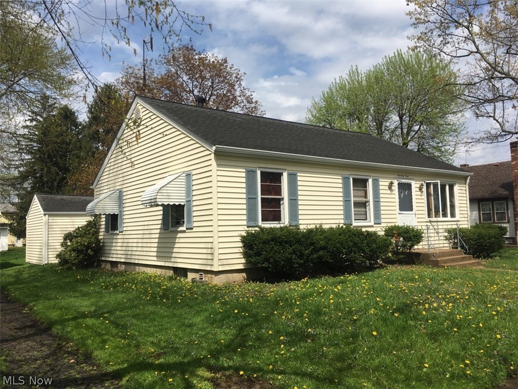This is a 3 bedroom Ranch that offers a great location on a corner lot ! Newer 30 year demensional shingles on roof about 5 years ago . Vinyl siding just professionally cleaned . Only 2 years ago ALL flooring was replaced with Laminate flooring . Sunroom adds space to enjoy relaxation and fun . This extra room is a year around room - YES heated and cooled ! Plus it has new laminate flooring . The auditor recently updated the Sq Ft to read accurately = 1152 . 1152 includes the sunroom . Home is located very close to Public Library , 2 access points to Rt 11 , Firestone Park , or the shops in Historic downtown Columbiana . Home had previously been rented but now is vacant and ready for immediate occupancy !