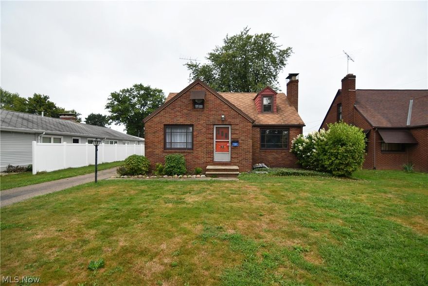 Loads of character and charm in this all brick cape cod at 131 Manor Ave SW Canton, Ohio 44710. Two fireplaces, one in the living room, the other is in the basement. Formal dining room offers original hardwood floors and a built-in china cabinet. Newer bamboo floors in living room and hallway, and original hardwood floors in both first floor bedrooms. Second floor bedroom is carpeted. Immediate possession.