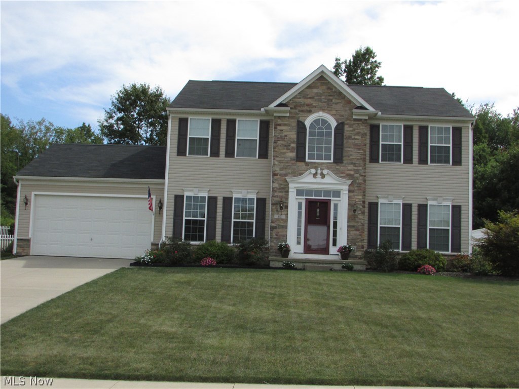 WOW! A stunning 4 bedroom, 2 1/2 bath Colonial in Fox Ridge of Tallmadge. One of the many highlights of this home is the 9' ceilings on the first floor. The open floor plan allows for the kitchen, large family room, and morning room to feel together. The family room has a fireplace, and opens to the formal living room. The gourmet kitchen has an island, wood floors, and has a 20x10 morning room, as well as a formal dining room. The natural wood floors run throughout the kitchen, morning room, and 2 story foyer. A master suite has ample closet space and vaulted ceilings. The large lot has a very large area of fenced space, a deck, and a shed. There is a 2 car garage, full basement (that is plumbed for a full bath and wet bar), first floor laundry, and so much more.