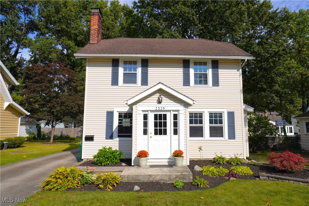Tucked in a lovely neighborhood in Cuyahoga Falls you will find this beautifully updated Colonial, ready to call home. From the moment you pass through the private entry hall into the living room you will be charmed by it's gleaming refinished hardwood floors, large windows with natural woodwork and a wood-burning fireplace with built-in cabinets. The details of the 1930s Art Deco design and its many updates make this home extra special, especially in the dining room and chef's kitchen, featuring stainless appliances. Located upstairs are 3 bedrooms and an updated bath with an outstanding tiled tub/shower area. An amazing bonus room is currently used as a dressing room but could be used as a 4th bedroom or study. This home has loads of updates including: newer roof, windows, furnace, HWT, and a waterproofed basement for your peace of mind. The large basement and Laundry room has loads of storage. 2 car Detached garage with electric opener, a partially fenced backyard and large deck off kitchen for entertaining. Call and make an appointment to see this home today.