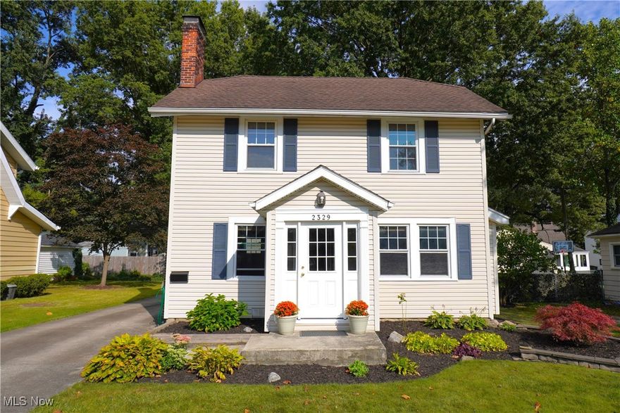 Tucked in a lovely neighborhood in Cuyahoga Falls you will find this beautifully updated Colonial, ready to call home. From the moment you pass through the private entry hall into the living room you will be charmed by it's gleaming refinished hardwood floors, large windows with natural woodwork and a wood-burning fireplace with built-in cabinets. The details of the 1930s Art Deco design and its many updates make this home extra special, especially in the dining room and chef's kitchen, featuring stainless appliances. Located upstairs are 3 bedrooms and an updated bath with an outstanding tiled tub/shower area. An amazing bonus room is currently used as a dressing room but could be used as a 4th bedroom or study. This home has loads of updates including: newer roof, windows, furnace, HWT, and a waterproofed basement for your peace of mind. The large basement and Laundry room has loads of storage. 2 car Detached garage with electric opener, a partially fenced backyard and large deck off kitchen for entertaining. Call and make an appointment to see this home today.
