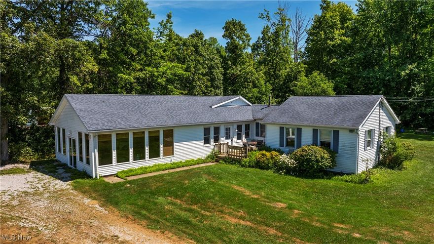 Set on 2.46 scenic acres with peaceful Lake Erie views, this 3-bedroom, 2-bath ranch offers both comfort and strong income potential. The main home features an open layout with a bright living space and a spacious kitchen, ideal for everyday living or entertaining.  Make this property your own!

Toward the back of the property sits a large rustic barn, previously used as an event space and a short-term rental. With its inviting character and setup for hosting, it is perfect for gatherings. Both the main house and the barn have generated rental income, making this a proven investment opportunity. 

Whether you are looking for a peaceful primary residence, an investment, or both, this one delivers flexibility, charm, and value with a beautiful lakeside backdrop.

Roof 2017
Septic 2007.