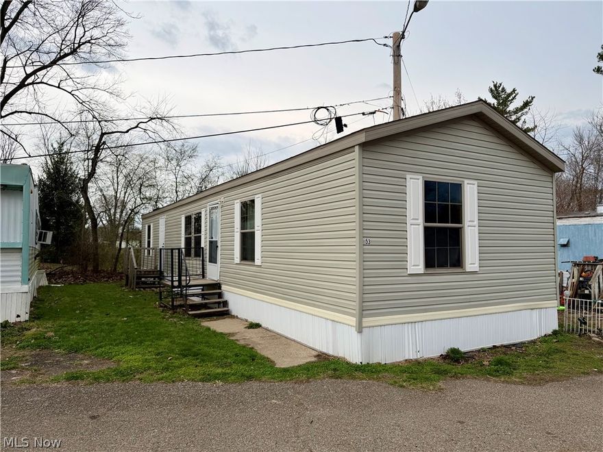 Check out this modern one-story mobile home in Massillon! Built in 2021, the open floor plan includes a large living room, a spacious eat-in kitchen that’s fully applianced with tons of cabinet space, and a sizable master suite with private bathroom. There are 2 additional bedrooms and a 2nd full bathroom. Laundry hookups are located in the hall for added convenience. Enjoy affordable, low-maintenance living in this quiet neighborhood, located just minutes from Downtown Massillon. The home can also be relocated if desired. Call today to schedule your private showing!
