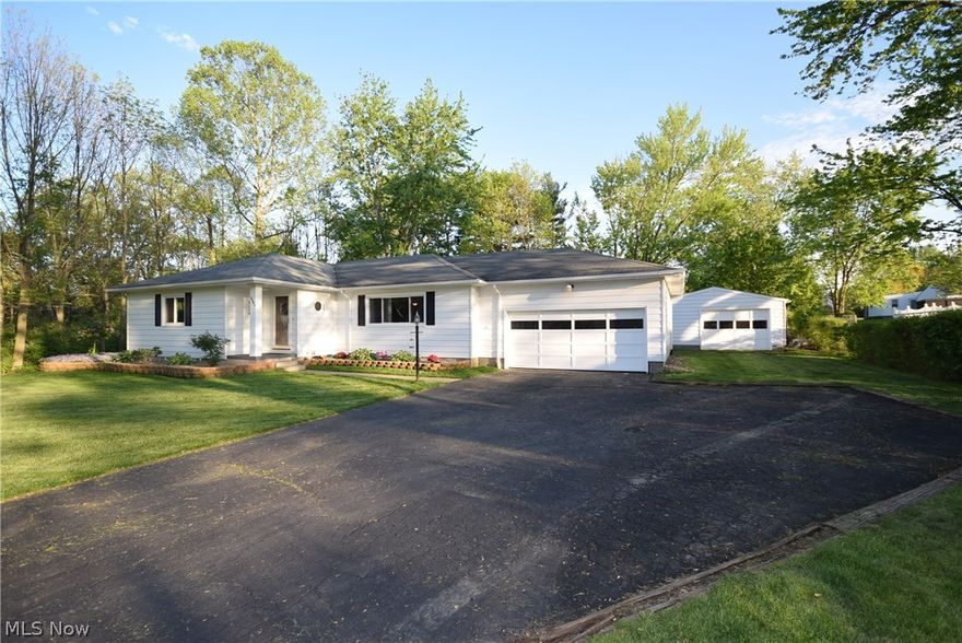 Welcome to this completely updated 3 bedroom, 2 full bath ranch in Copley on almost half an acre.  The large open living room boasts crown molding and an abundance of natural light.   Kitchen features granite counter tops, new appliances and hardwood floors that continue into the dining room.  Master suite has a large master bath with a walk-in shower, walk-in closet and first floor laundry.  Finished lower level offers a bonus room perfect for a play room or office, large open concept family room and dry bar.  Need more storage space?  The basement also offers a craw space, utility room and storage closet.  The sliding glass door opens from the dining room to the large deck and tranquil, well manicured lot.  The attached garage 2 car garage and detached 1.5 car garage both offer electric and additional space is available in the shed.  Updates Include: Flooring 2014, Kitchen appliances 2014, A/C 2014, Hot Water Tank 2014, Windows 2015, Sump Pump April 2017.  Other Info: Water Softener