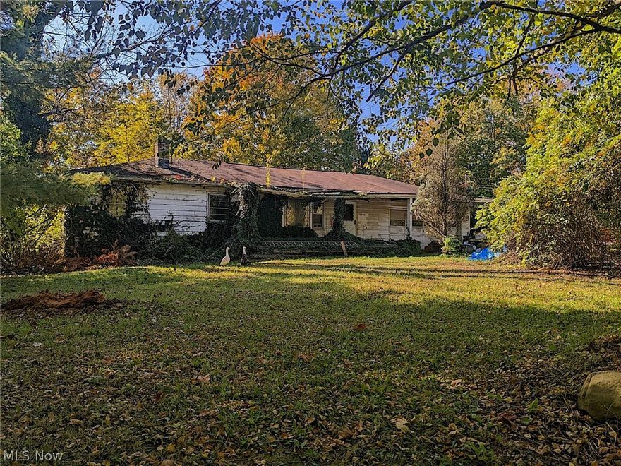 Don't miss out on this 3 bed 1 bath fixer upper sitting with just under an acre on a dead-end cul-de-sac. This property is priced to sell and ready for all your personal touches. Home has some remaining hardwood floors and would make a great opportunity for the investor, flipper or first time home buyer looking for an affordable home. Bring your vision of the end result of what this home can be.