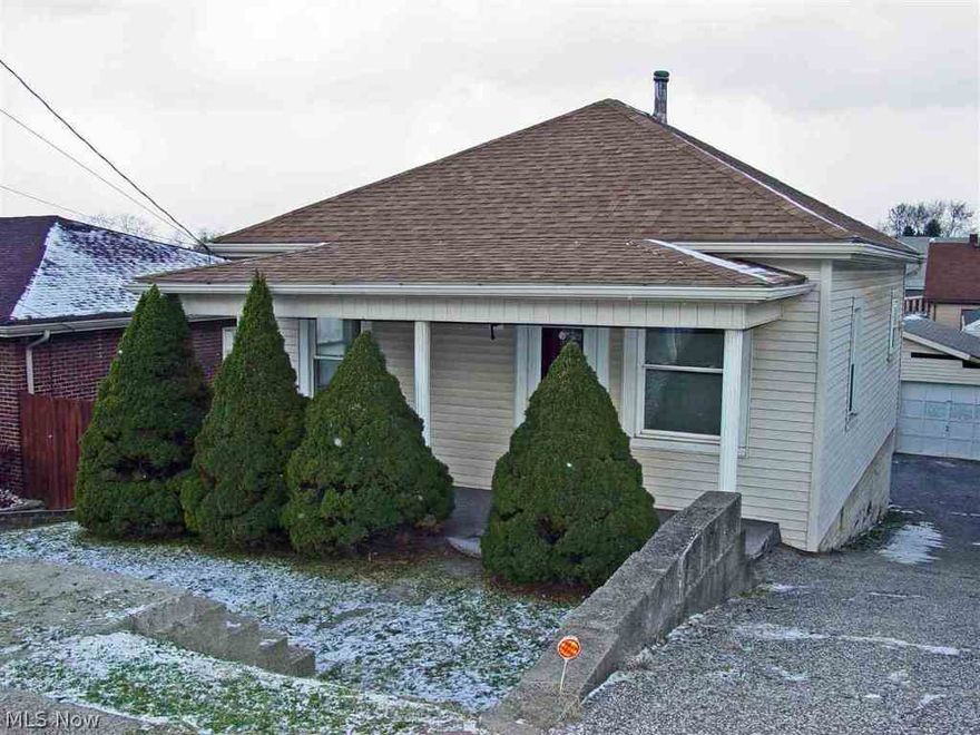 Potential is there for this 2 BR, 1 BA ranch w/ newer roof, finished basement & 2 car detached garage.