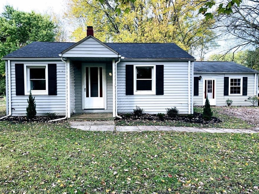 STOP!!!! Look no further this ranch home situated on one acre of land has more features than you can imagine!  Entering you will notice how cozy this living room is with a wood burning fireplace. Two spacious bedrooms with plenty of closet space. Updated full bath with new laminate flooring. The kitchen has an abundance of cabinet and counter top space. Perfect for all of your creative recipes. Over sized laundry area with built in storage cabinets. Do you need an additional living area and kitchen? Well here you go! The 23x21 additional living suite has a full separate kitchen, large living area and another full bath! More great features include breezeway leading out to the enclosed back yard, three storage sheds, new carpeting and flooring, freshly painted throughout. Be amazed and be ready to make this home yours!