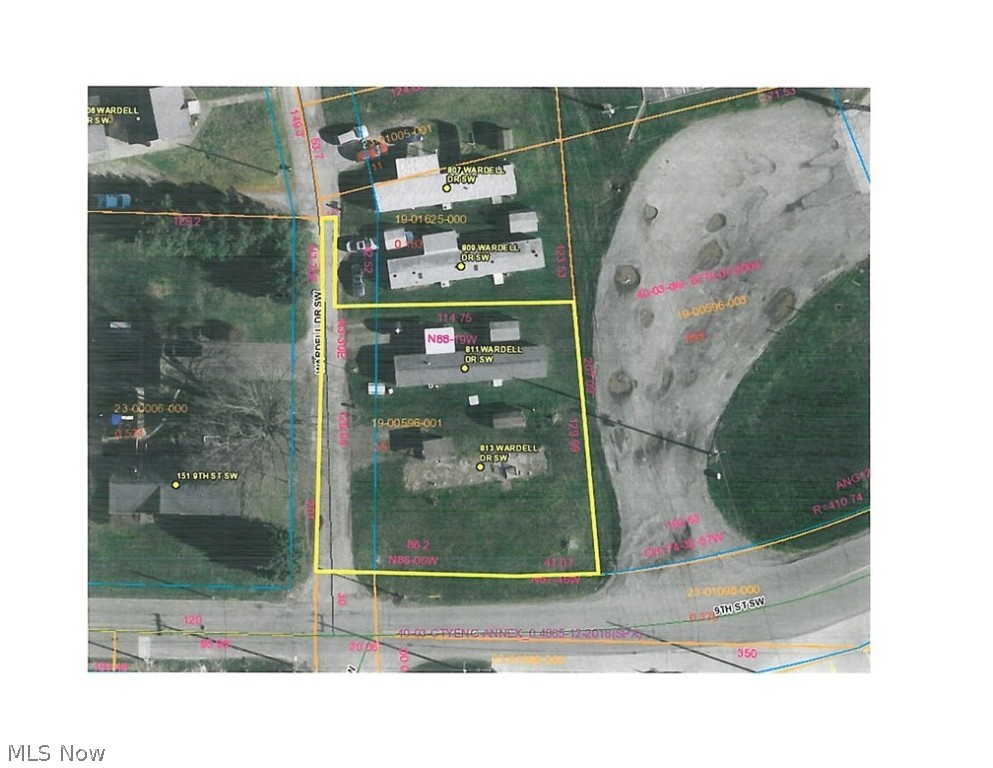 1/3 acre lot. Very close to I-77 exit. No village zoning restrictions. Village water and sewer services on lot along with gas and electric. Great location for an office or garage with rental income.