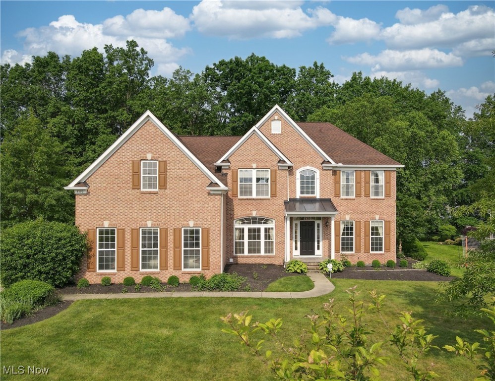 Welcome to this stunning brick front Center Hall Colonial, nestled on a serene private lot in the highly desirable Blossom Glen community. 3,637 sq ft of exquisite living space, dual staircase, home showcases high-end professionally finishes throughout, offering elegance, comfort, & functionality at every turn. Step into the 2-story foyer w/gleaming hardwood flrs that flow seamlessly into a spacious 1st flr office adorned w/French glass doors. Breathtaking, step-down great rm w/hwd floor & soaring ceilings, a floor-to-ceiling stone gas fireplace, & expansive windows & skylights that flood the space w/natural light. Adjacent to the great rm is the heart of the home, your gourmet chef’s kitchen, beautifully remodeled w/in the last 7 yrs, featuring a massive granite center island perfect for entertaining, abundant custom cabinetry, high-end SS appliances, a 5-burner cooktop, double ovens, & a built-in wet bar. Natural lighting from the 2 skylights & wall of windows provides panoramic views of the backyard. Beautiful hardwood flrs flows through the formal Dining rm w/tray ceilings & into the charming living rm creating a warm & inviting atmosphere. For a more relaxed experience, retreat to the 3-season sunroom, offering tranquil views from every angle. Upstairs, the luxurious primary suite offers a private escape w/2 huge walk-in closet, & additional sitting rm. The glamour bath, remodeled w/in the past 5 yrs, features dual vanities, granite countertops, a luxury walk-in tile shower, & extensive custom cabinetry. Additional 3 spacious bedrooms w/large closets, and a beautifully updated hall bathroom w/double sinks, complete the upper level. The expansive laundry rm includes a walk-in pantry, utility sink, & w/a washer & dryer. Lg unfinished bsmt offers endless possibilities, a home gym, or a media rm, & w/rough-in plumbing. Outside, enjoy the backyard w/a stone paver patio, 3-car side entry garage. What a rare gem in a prime location, Begin your Story Here!