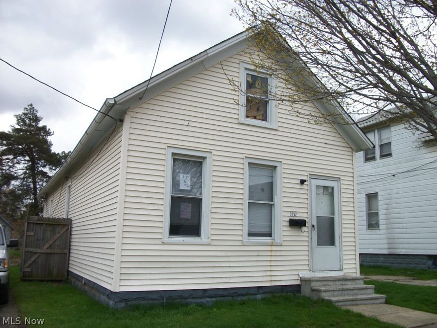 FIRST FLOOR LAUNDRY ROOM. ROOF APPROX. 8 YEARS OLD. NEWER WINDOWS.