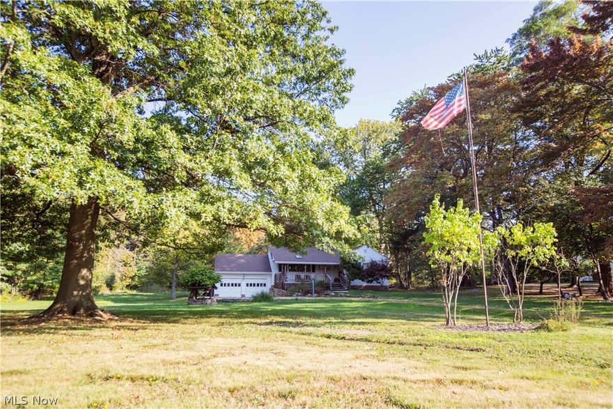 Don’t miss this ranch with a great lot and location in Orange Village! The interior offers 3 bedrooms, 2 full bathrooms, a large great room with vaulted ceilings and a brick fireplace with a wood burning insert, dining room, galley kitchen, laundry/mudroom, basement, and access to the attached 2 car garage. A long driveway provides privacy from the road, while the beautifully wooded 1.69 acre lot creates a quiet and peaceful retreat.  You’re going to love the incredibly convenient location of this home. It’s close to the Harvard /271 interchange, making for an easy commute to virtually anywhere in Cleveland and its east side suburbs! Less than 3 miles to Ahuja Medical Center, less than thirty minutes to Downtown Cleveland, right around the corner from the Beechmont Country Club, and only minutes from the endless fine dining, shopping, and entertainment options at Eton on Chagrin Blvd. Septic system replaced ~2006, roof replaced 2015, and new gutters and downspouts also in 2015.