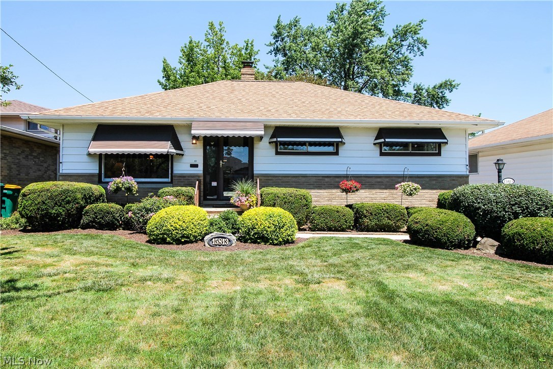 Welcome to this spectacular three bedroom, one & half bath spacious ranch home. The exterior of this home has won beatification awards from the city of Maple Heights. Gorgeous landscaped all around the home, makes enjoying the backyard & deck that much more. You can enjoy the backyard with the swing & beautiful gold fish pond with tea house. Two & half oversize car garage. Come inside to the magnificent open floor plan, living room opens to the eat in kitchen area which has new fridge in 2016, grill is plumbed for gas & kitchen also has double wall oven & all the pantry doors are pull out & pull down upper cabinets. Tons of space to entertain family and friends with the family room, fireplace is gas with multiple vents, dining room which is all open to the kitchen. The home is handicap accessible with stair lift & stair glide. First floor flooring has been recently replaced through out. Beautiful spacious bedrooms all with ceiling fans. First floor bath room has been remodeled bright a