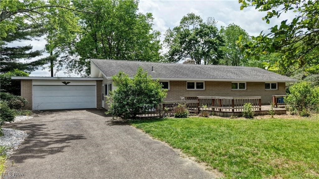 Are you looking for a one level home in between Dover and New Philadelphia with that out of town feel? Look no further! This ranch sits on 1.02 acres. You can enjoy outside living on the front deck or back patio. Including 3 bedrooms and 2.5 bath. Newly installed carpet. With a finished basement