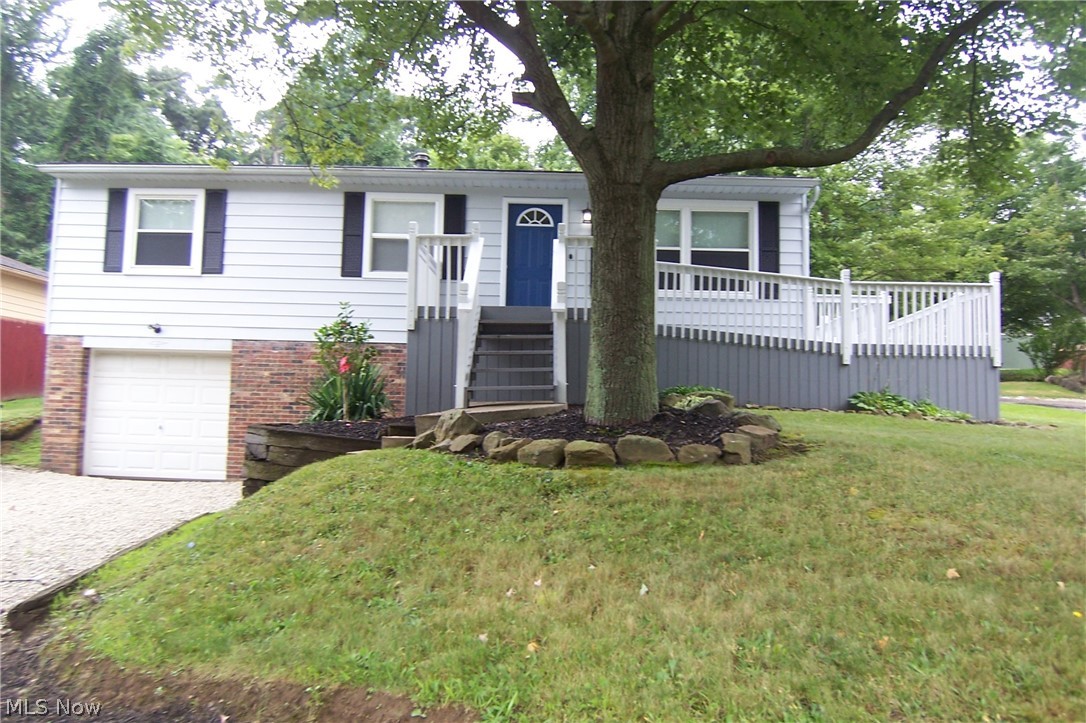 Completely remodeled! Gorgeous! Within the last year new furnace, kitchen, baths, all paint, all flooring! Wiring updated outside and box! 3 bed 1 1/2 bath raised ranch with basement family room, extra sq ft! Nicely landscaped! Rear patio! Ramp! Backs up to nature preserve!