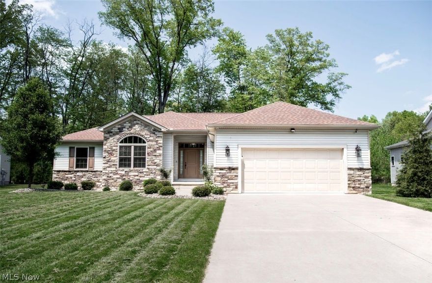 Located in a desirable Howland neighborhood, this beautifully maintained ranch home at 101 Muirfield offers the perfect blend of modern style and everyday comfort. Built in 2020, the home features an open and functional layout with luxury vinyl tile flooring throughout, creating a clean and durable finish that complements the home’s contemporary design. The updated bathrooms provide a fresh, upscale feel, while the kitchen stands out with shaker-style cabinetry, granite countertops, and quality finishes that make the space both stylish and practical for daily living or entertaining.

Outside, the property continues to impress with thoughtful upgrades designed for convenience and curb appeal. A professionally installed sprinkler system helps maintain the lawn with ease, while custom remote-controlled blinds add a touch of luxury and modern functionality throughout the home. With its newer construction, upgraded features, and move-in-ready condition, this home offers buyers a rare opportunity to own a modern ranch in a great location without the need for updates or renovations.
