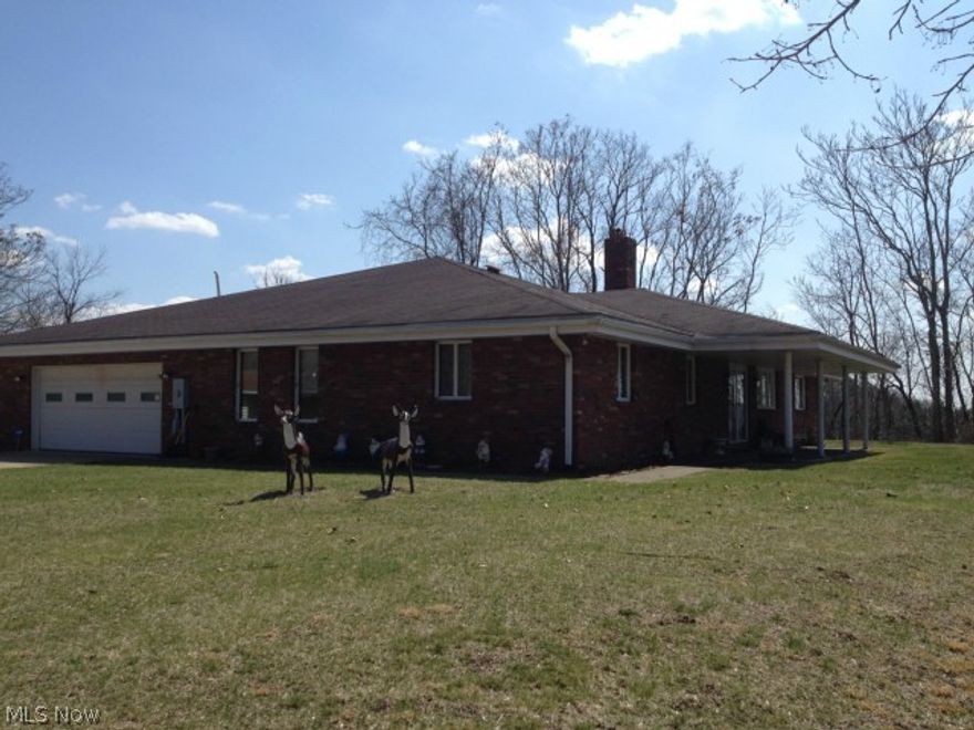 Secluded and private 3 bedroom, 2 full bath brick ranch on 6 +/- acres just outside city limits.  One owner home, first time offered for sale.  Large eat in kitchen opens to dining room and living room with brick fireplace. Master bedroom with full bath. Indoor heated swimming pool and hot tub. Desert Aire system installed to help with moisture and heat. Attached 2 car garage. Detached 1 car garage as well. New septic 2012'. New pump for water 2014'. Any mineral rights owned by seller will transfer. Seller has been offered to lease them but did not sign. Come & See!